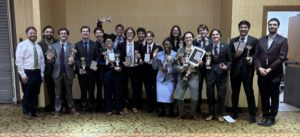 The Truman Forensics Team poses with their PKD awards for a team photo.