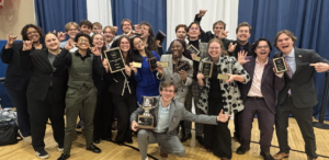The Forensics team poses together one last time with their awards after NFA 2026