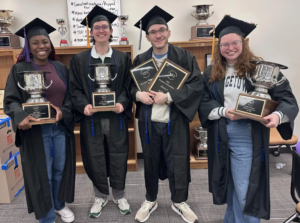 Jessie Philips (Left), Briggs Maynor (Center), Aiden Breesawitz (Center), and Alex Peterson (Right) pose together, in graduation ropes, with forensics awards